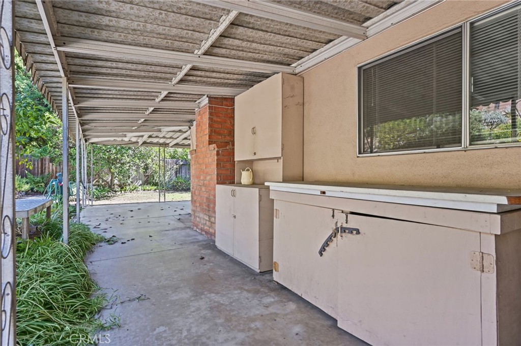 The covered side yard has the perfect spot of a potting area - 5062 W Knoll Drive, Yorba Linda CA 92886 - photo 44