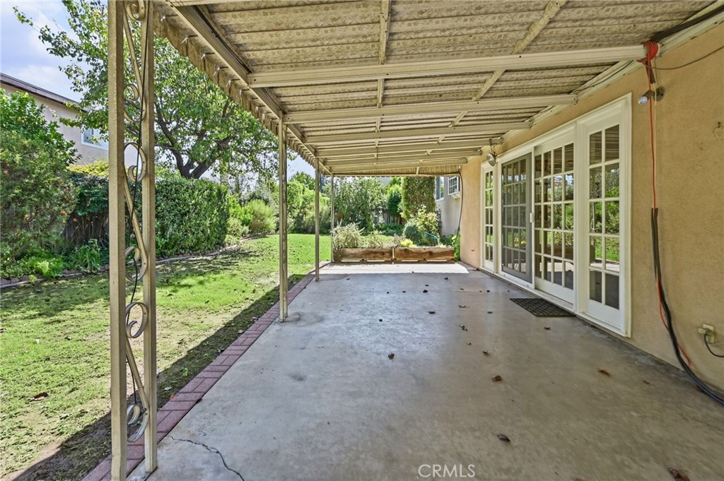 Side view of the covered patio - 5062 W Knoll Drive, Yorba Linda CA 92886 - photo 47