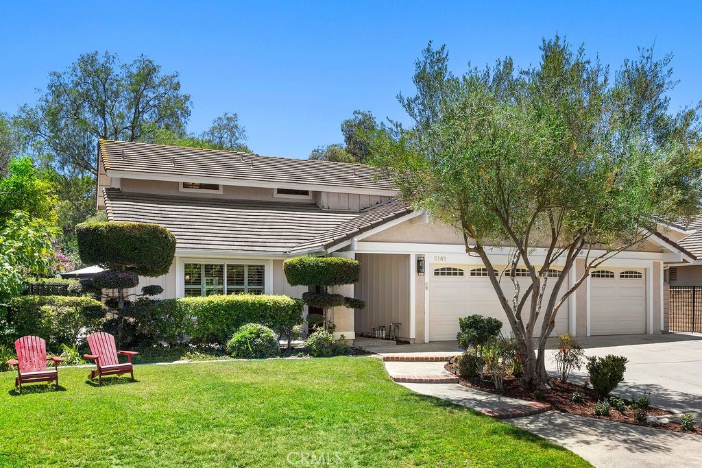 Welcome home to serene Travis Ranch and 5161 Via Marcos set within a pride of ownership cul-de-sac - 5161 Via Marcos, Yorba Linda CA 92887 - photo 1