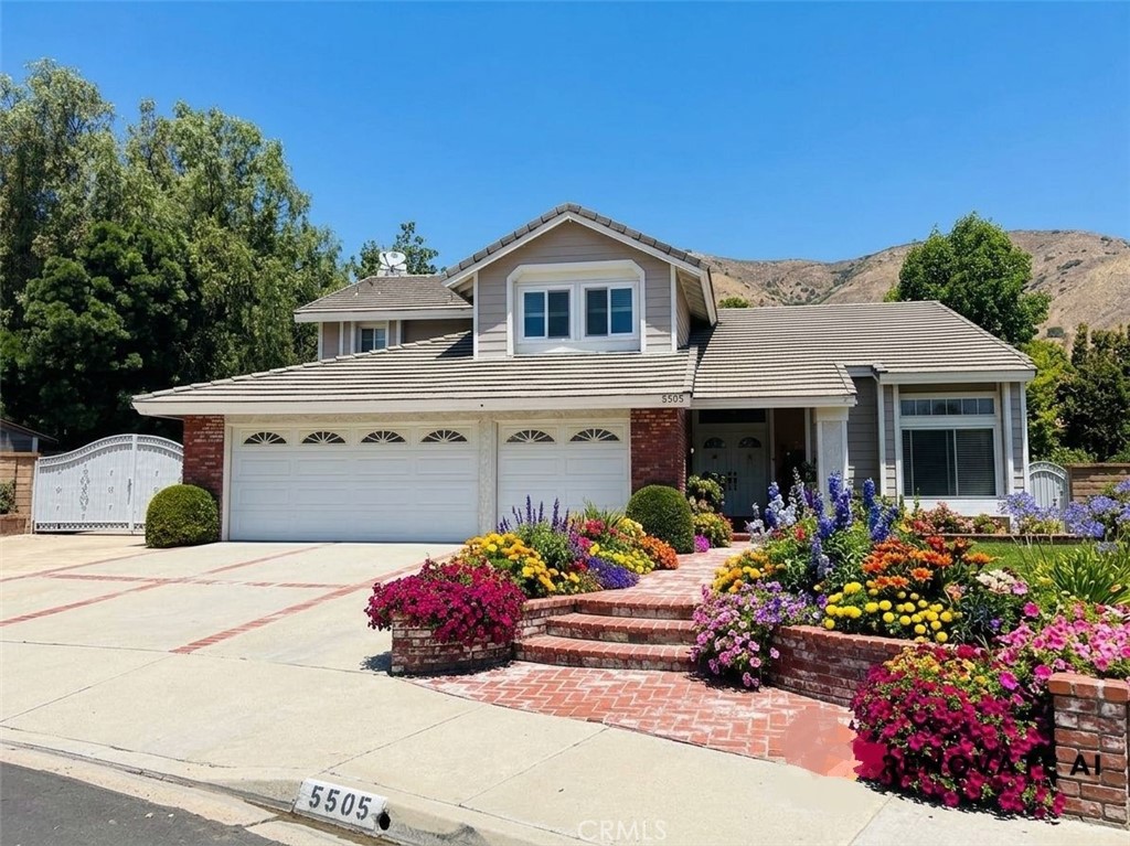 AI enhanced. Color flowers added to front. - 5505 Green Hollow Lane, Yorba Linda CA 92887 - photo 2