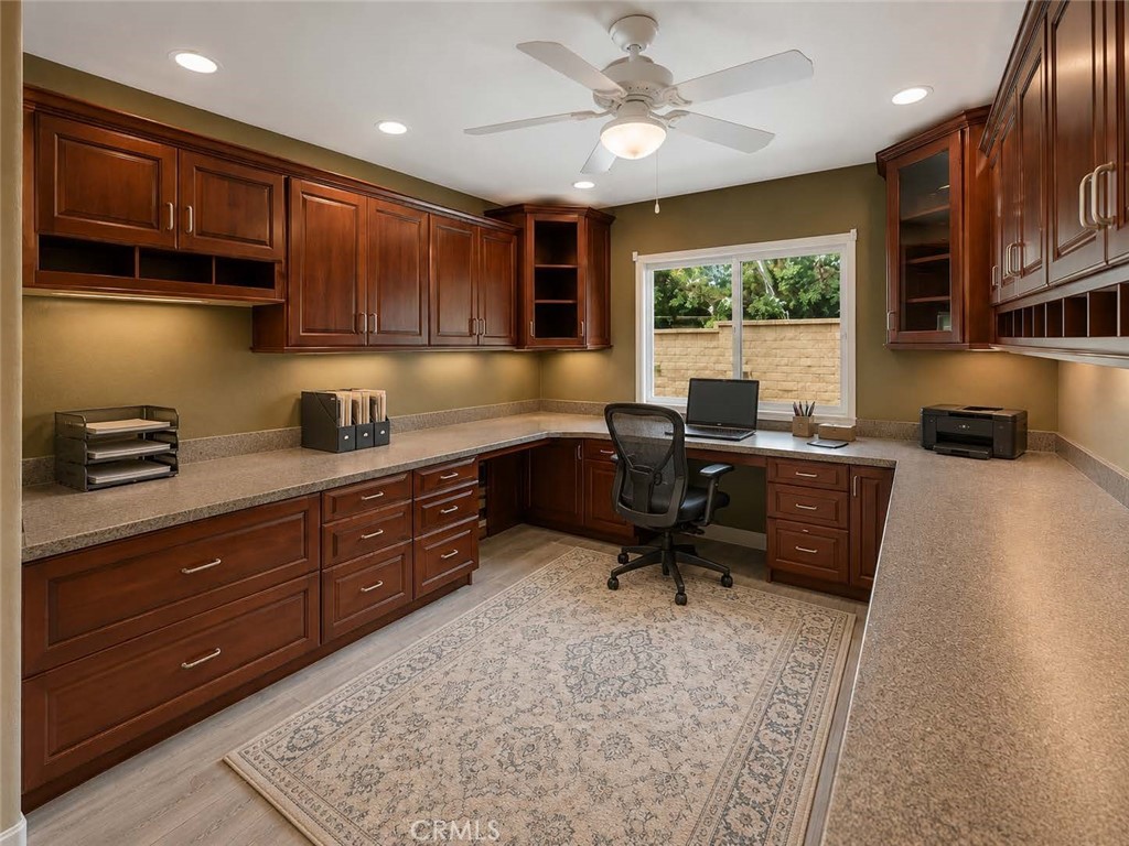Main floor bedroom currently used as an office with built-ins. - 5505 Green Hollow Lane, Yorba Linda CA 92887 - photo 9