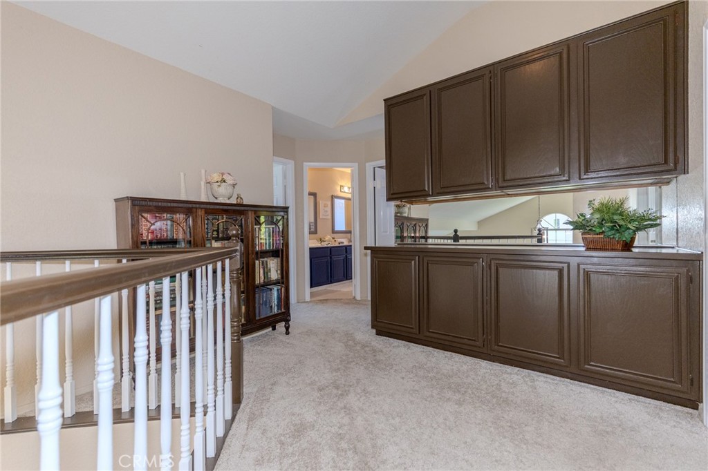Upstairs hallway with ample built-in linen storage. - 5505 Green Hollow Lane, Yorba Linda CA 92887 - photo 11