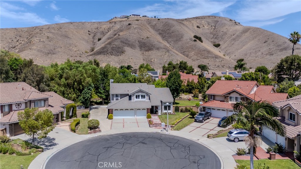 Aerial view of the culdesac location with massive gated RV parking to the left and enormous right side yard with abundan - 5505 Green Hollow Lane, Yorba Linda CA 92887 - photo 23