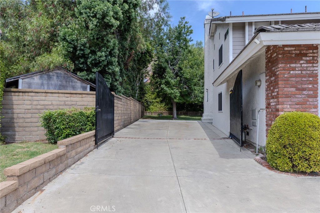 Huge gated RV parking on left side of the house. - 5505 Green Hollow Lane, Yorba Linda CA 92887 - photo 28