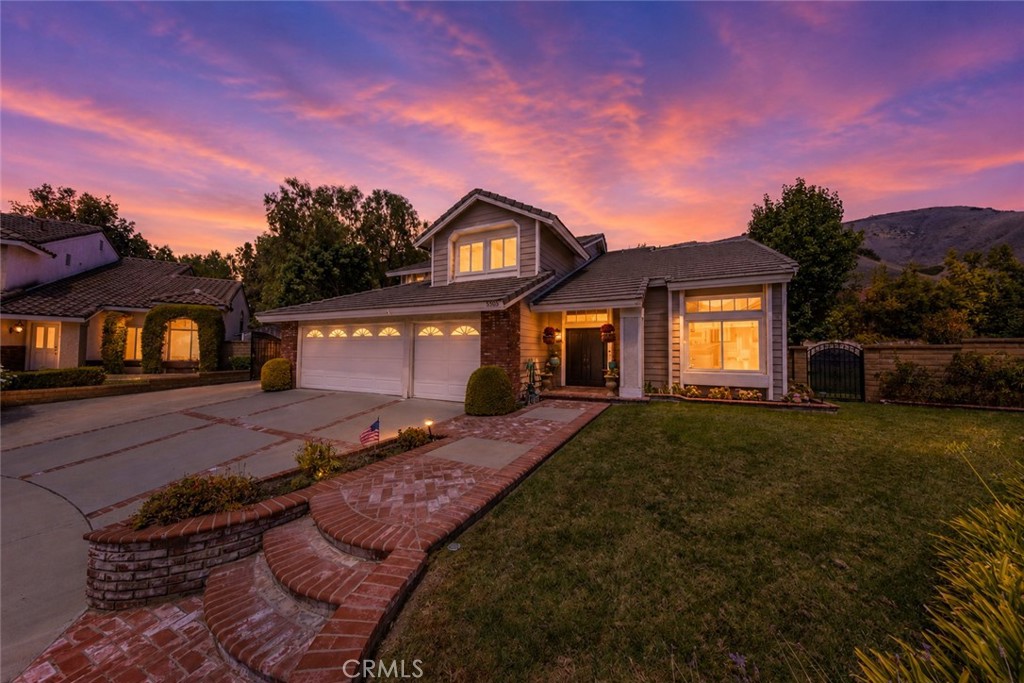 AI enhanced twilight photo of the front exterior. - 5505 Green Hollow Lane, Yorba Linda CA 92887 - photo 30