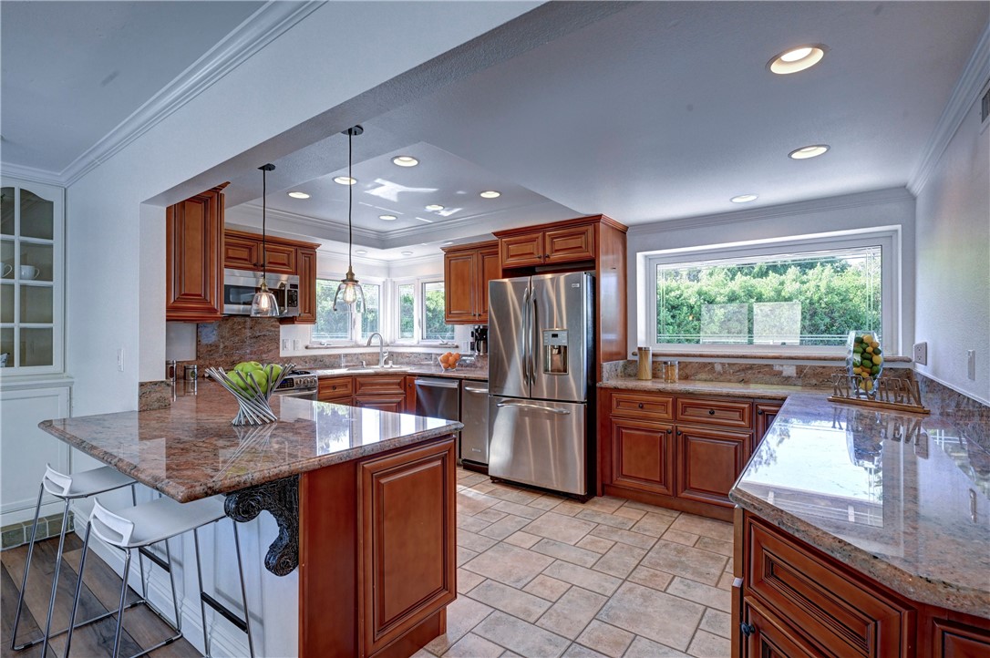 Note the bar seating on the left side of this photo. - 5561 Orchard, Yorba Linda CA 92886 - photo 5
