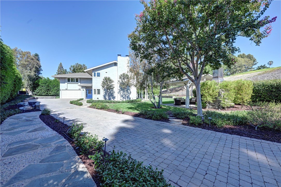 Drive up on a driveway made of pavers. - 5561 Orchard, Yorba Linda CA 92886 - photo 12