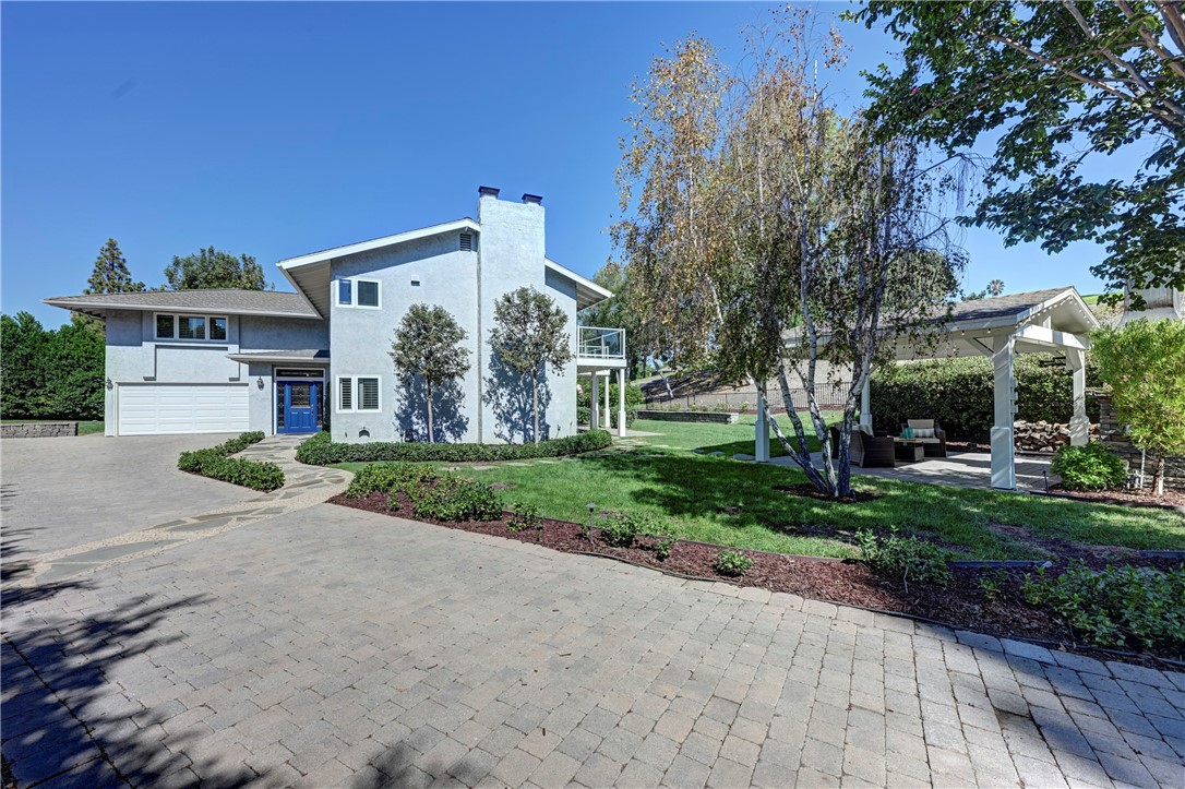 Note the large outdoor patio with stone fireplace on the right. - 5561 Orchard, Yorba Linda CA 92886 - photo 13