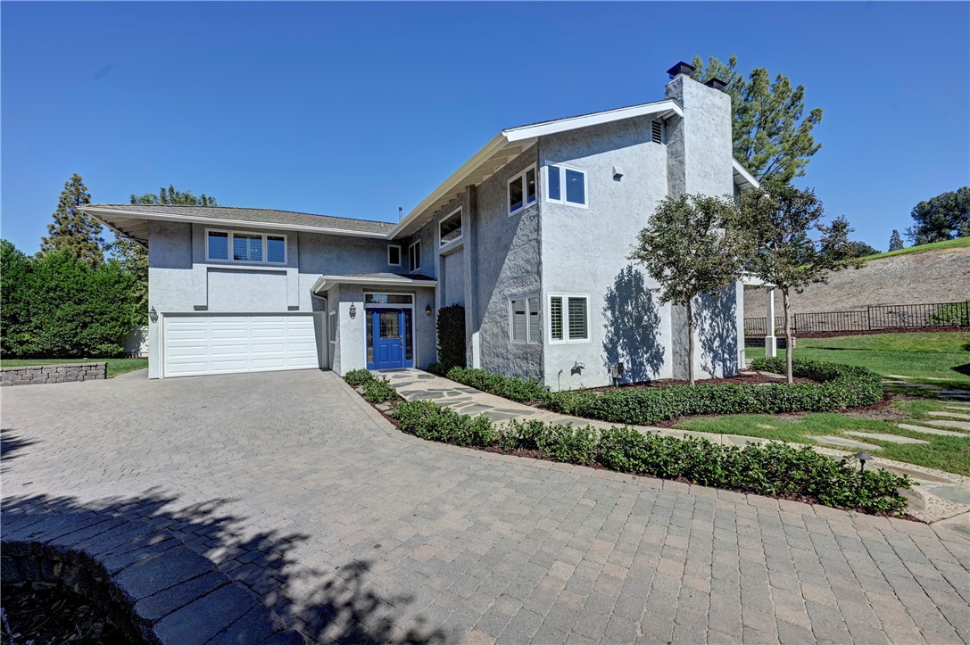 Note the beautiful blue front door/entrance. - 5561 Orchard, Yorba Linda CA 92886 - photo 21
