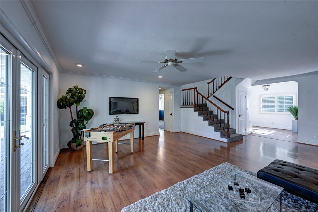 View in the Den. To the left are the French doors to the outside patio. To the right is the entrance to the house. - 5561 Orchard, Yorba Linda CA 92886 - photo 25