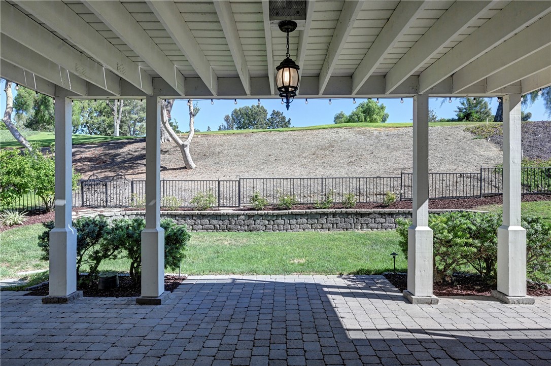 Your view from the downstairs French doors to the covered patio looking out the backyard and golf course. - 5561 Orchard, Yorba Linda CA 92886 - photo 26