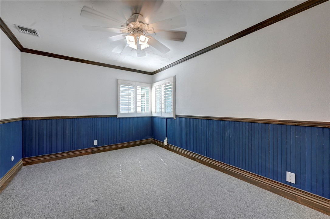 Bedroom #2 has a lighted ceiling fan and shutters on the windows. - 5561 Orchard, Yorba Linda CA 92886 - photo 33