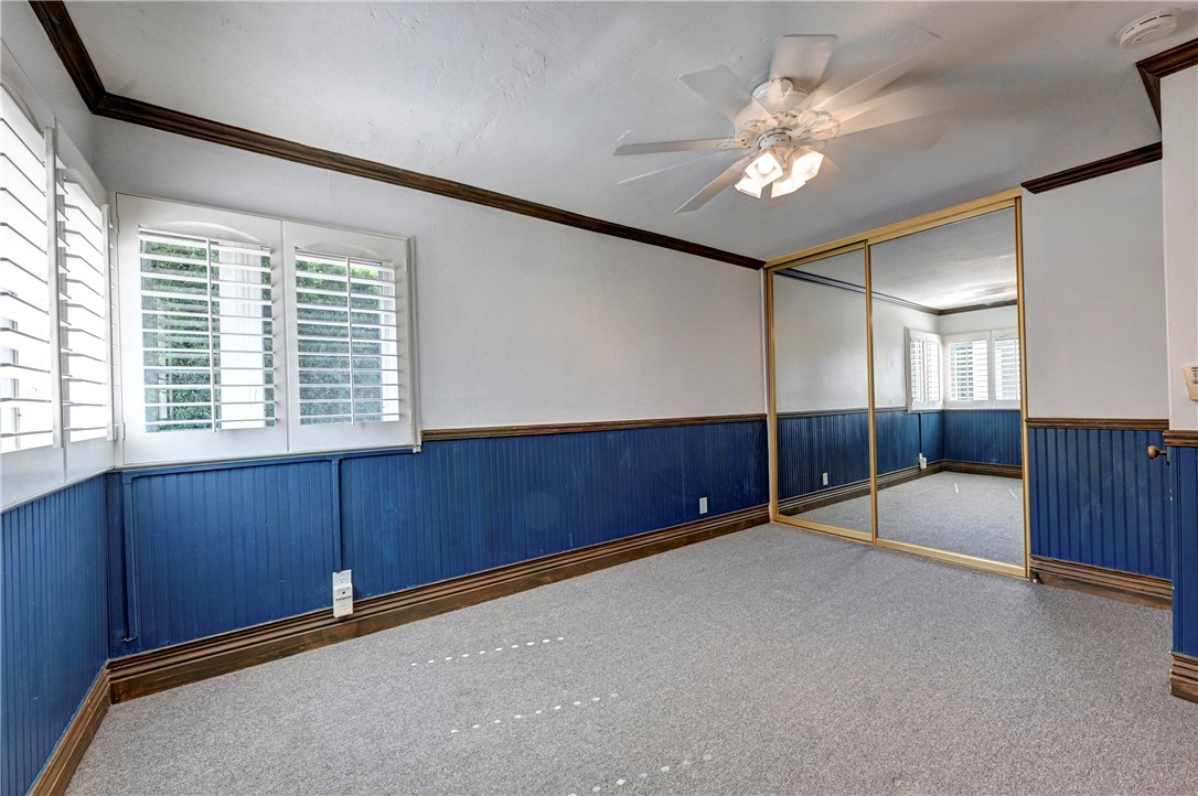 Downstairs bedroom #2 has mirrored wardrobe doors. - 5561 Orchard, Yorba Linda CA 92886 - photo 34