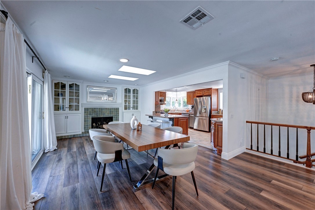 Note the fireplace and the built in cabinetry in the dining room. - 5561 Orchard, Yorba Linda CA 92886 - photo 36