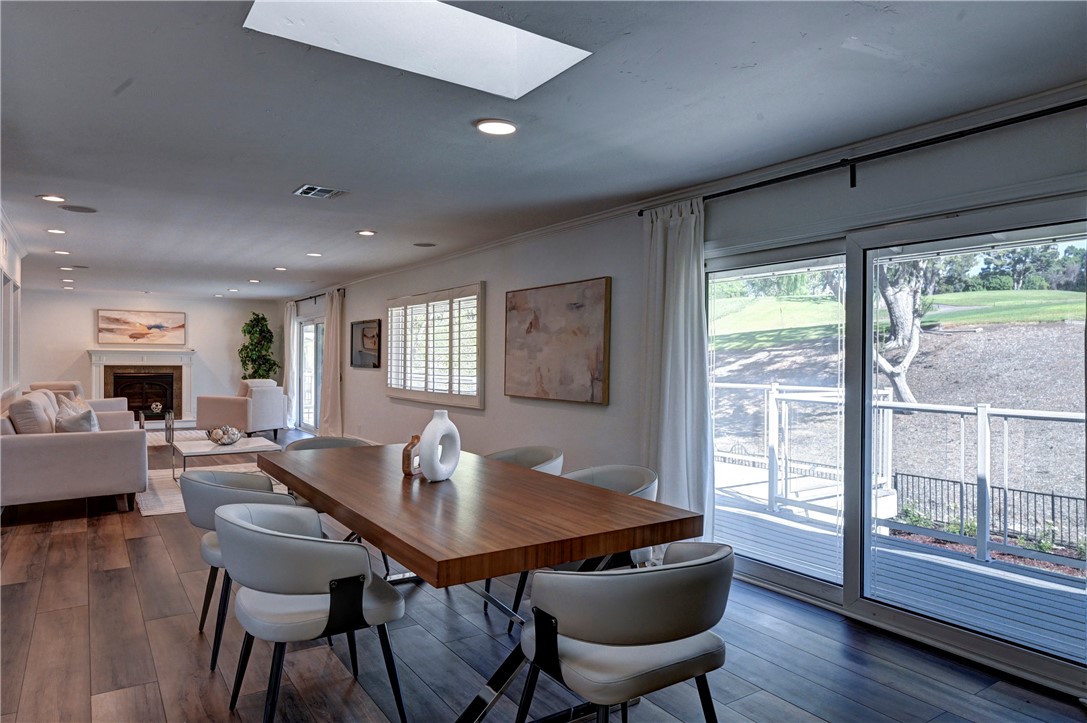 Open concept living and gorgeous views of the golf course while dining. - 5561 Orchard, Yorba Linda CA 92886 - photo 40