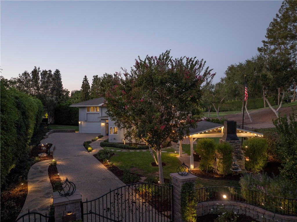 There is a pedestrian gate to the left of the electronic driveway gate. - 5561 Orchard, Yorba Linda CA 92886 - photo 59