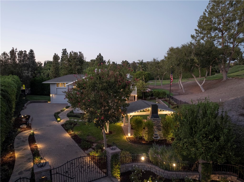 The landscape lighting is beautiful at dusk. - 5561 Orchard, Yorba Linda CA 92886 - photo 64