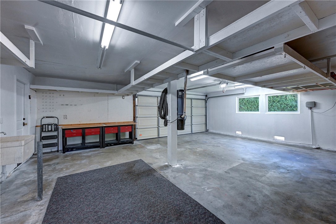 Lots of storage area and work bench in this spacious garage. - 5561 Orchard, Yorba Linda CA 92886 - photo 68
